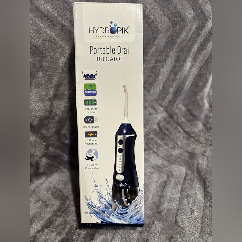 Hydropik portable oral‎ irrigation tool